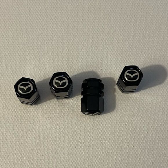 Mazda Valve Stem Caps in Black NWT - Picture 1 of 4